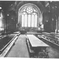 The Great Hall showing the Ashburton Shield hanging above the left hand door and original organ, most likely taken in 1900