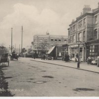 Postcard showing the shops on Park Road, now called Park Hall Road